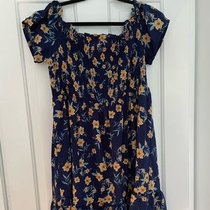 Blue and yellow floral midi dress. Ruched upper body. Flowy and light!